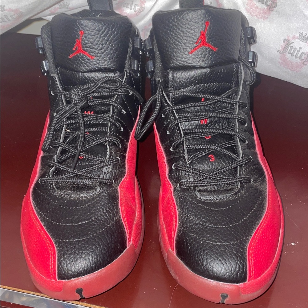 Black and red air Jordan 12s (offers welcome)